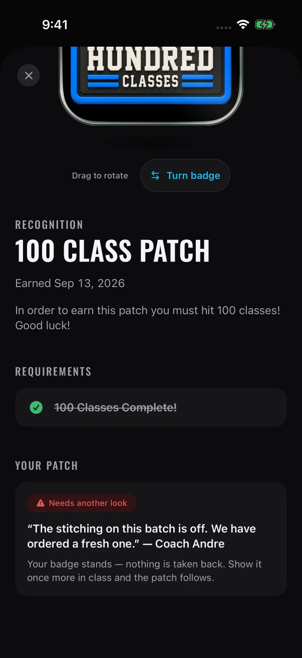 Your coach's words are quoted under the red chip, and the badge stays earned.
